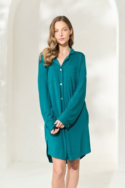 Woman wearing juniper green button-up modal boyfriend shirt 