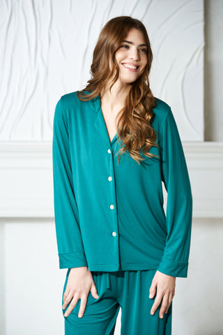 close up of soft and sustainable modal womens button up pj set in teal green
