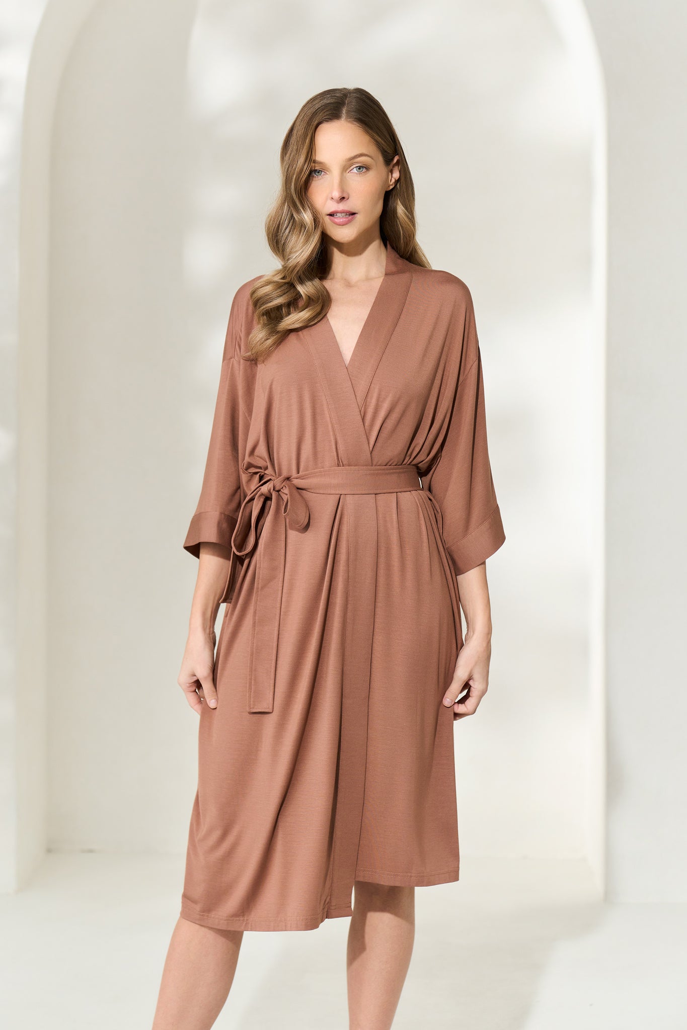 Woman wearing mocha mousse knee-length modal robe with waist tie
