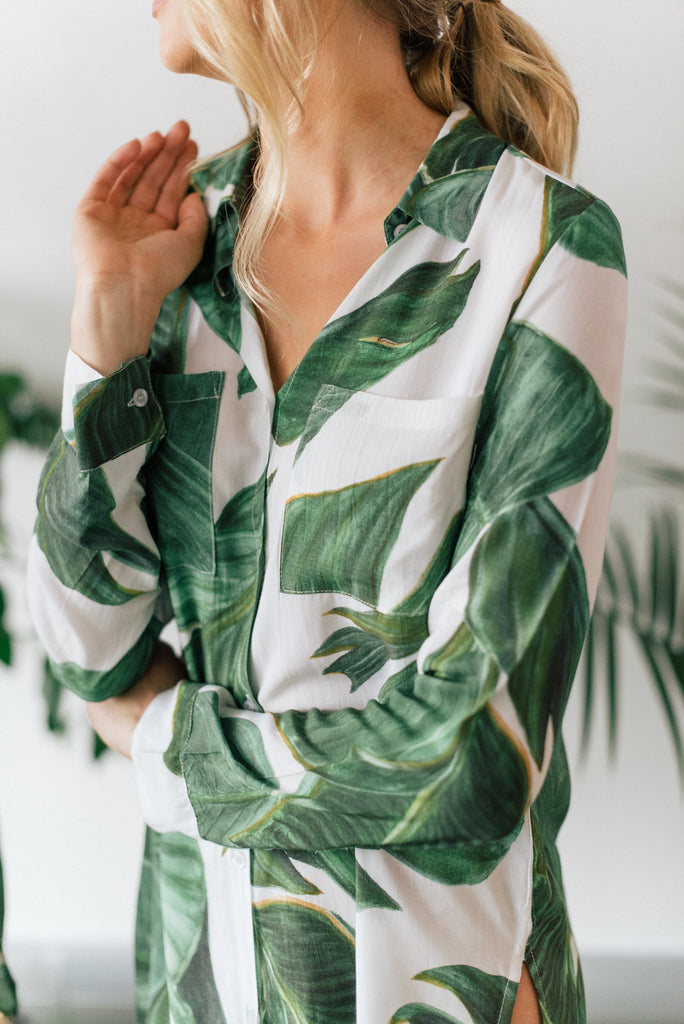 Close up view of palm print boyfriend shirt showing breast pockets. 