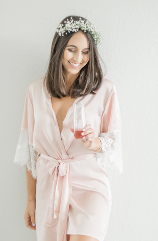 bridesmaid celebrating a wedding in Blush By Catalfo robe