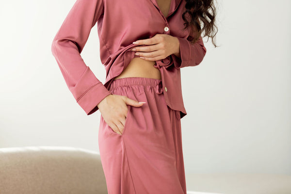 a model shows pyjama pant pockets 