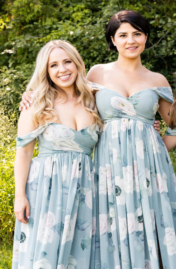 bridesmaids wearing sage dresses with large floral print