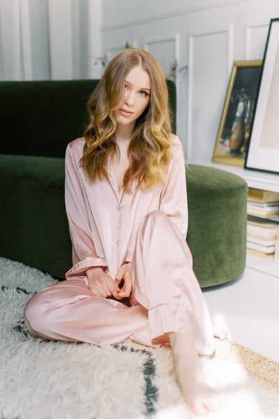 model wearing solid colour blush pajama set in toronto from by catalfo