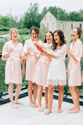 wedding day celebrations at Elora Mill wearing by catalfo bridal robes