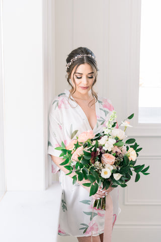 bridesmaids wearing pink and white floral peony robe for getting ready
