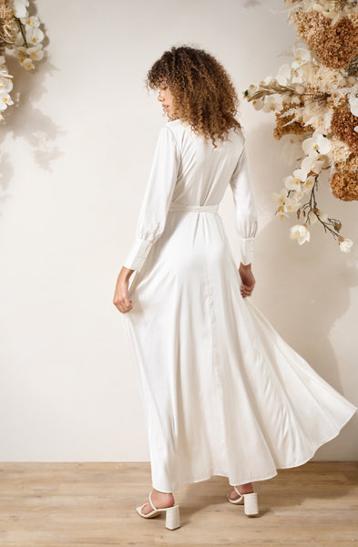back view of a long sleeve modern wrap dress for elopement weddings